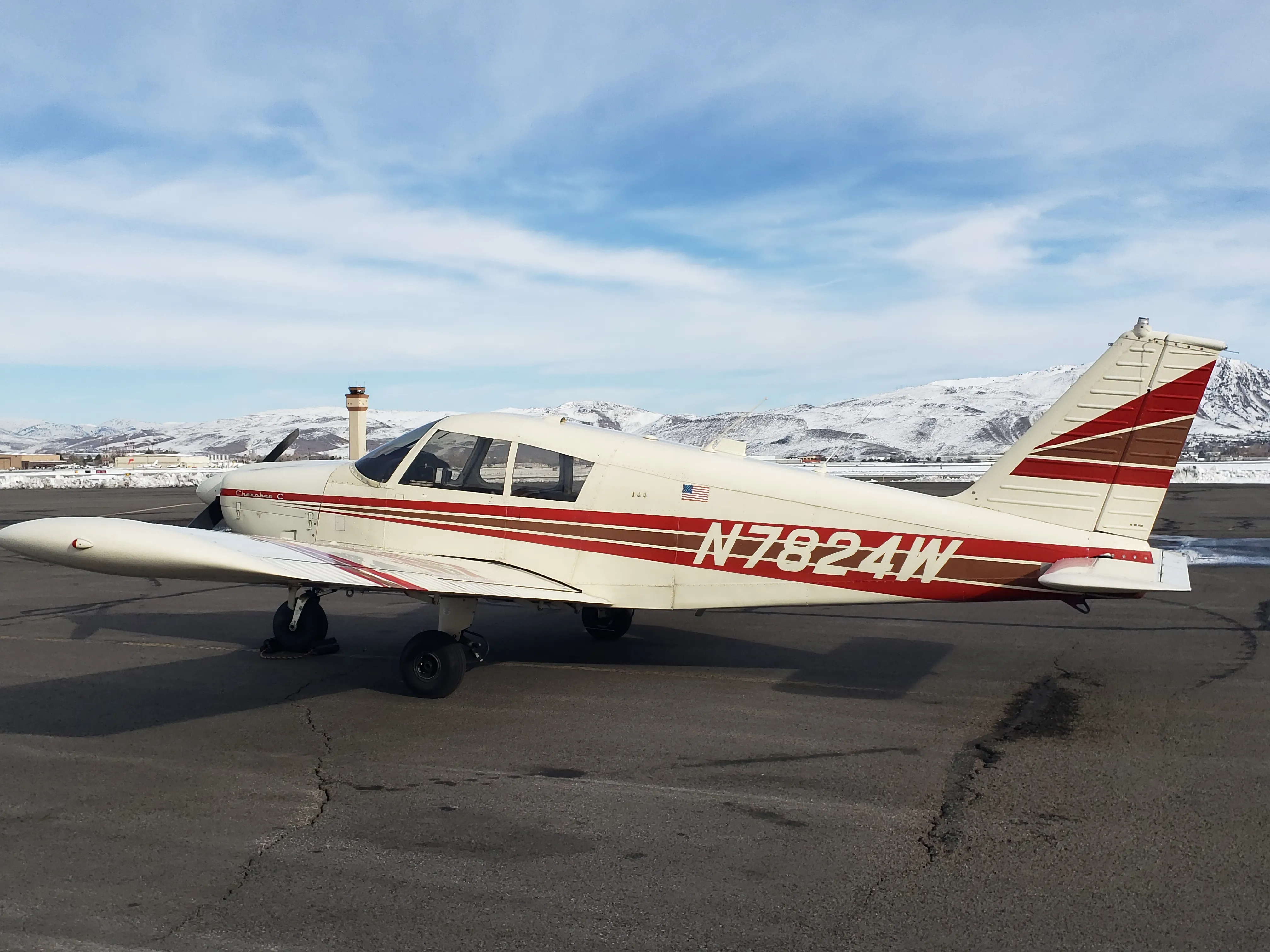 Piper Cherokee 180 N7824W in flight over Nevada
