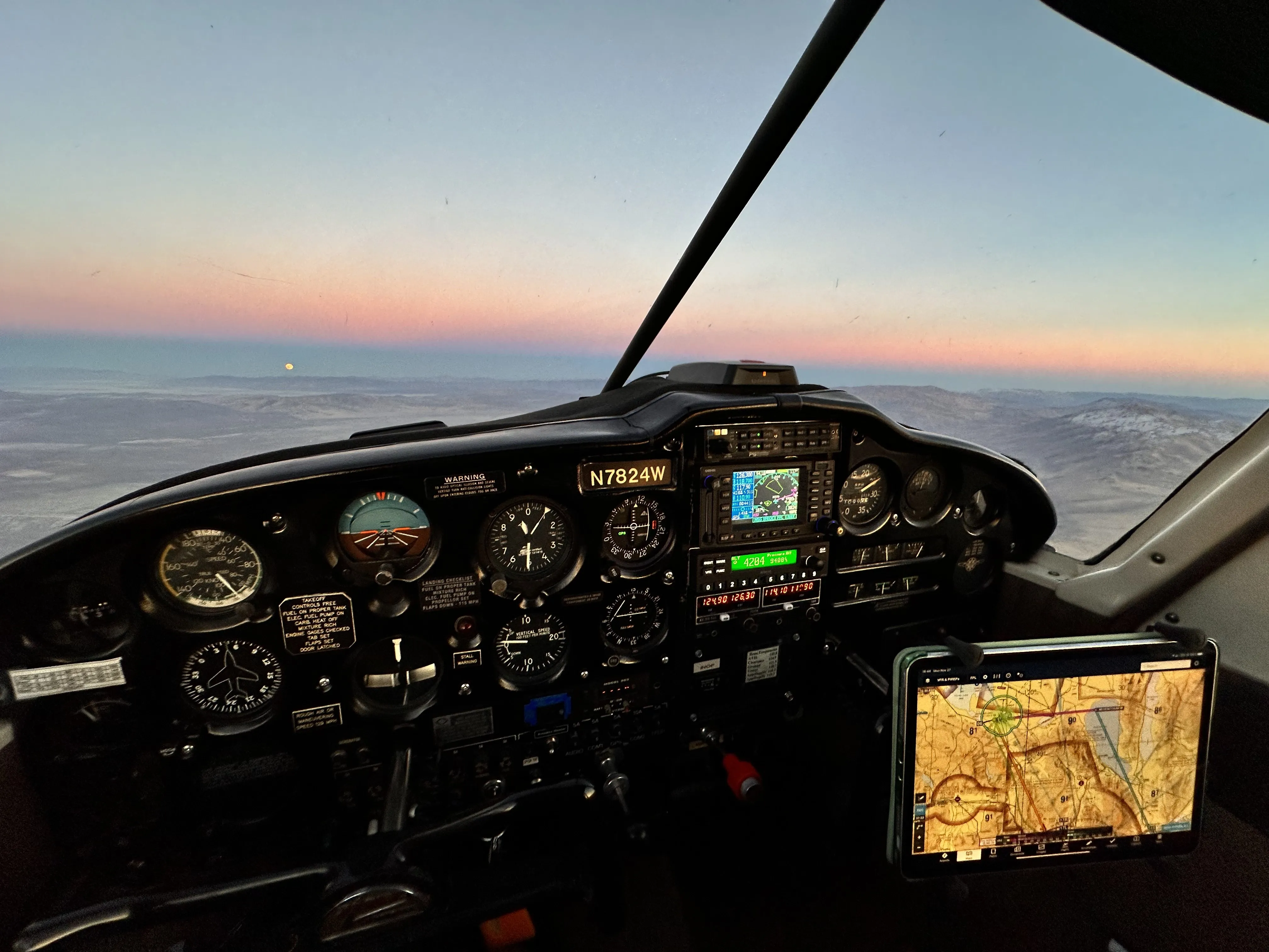 Instructor and student working on instrument approach charts
