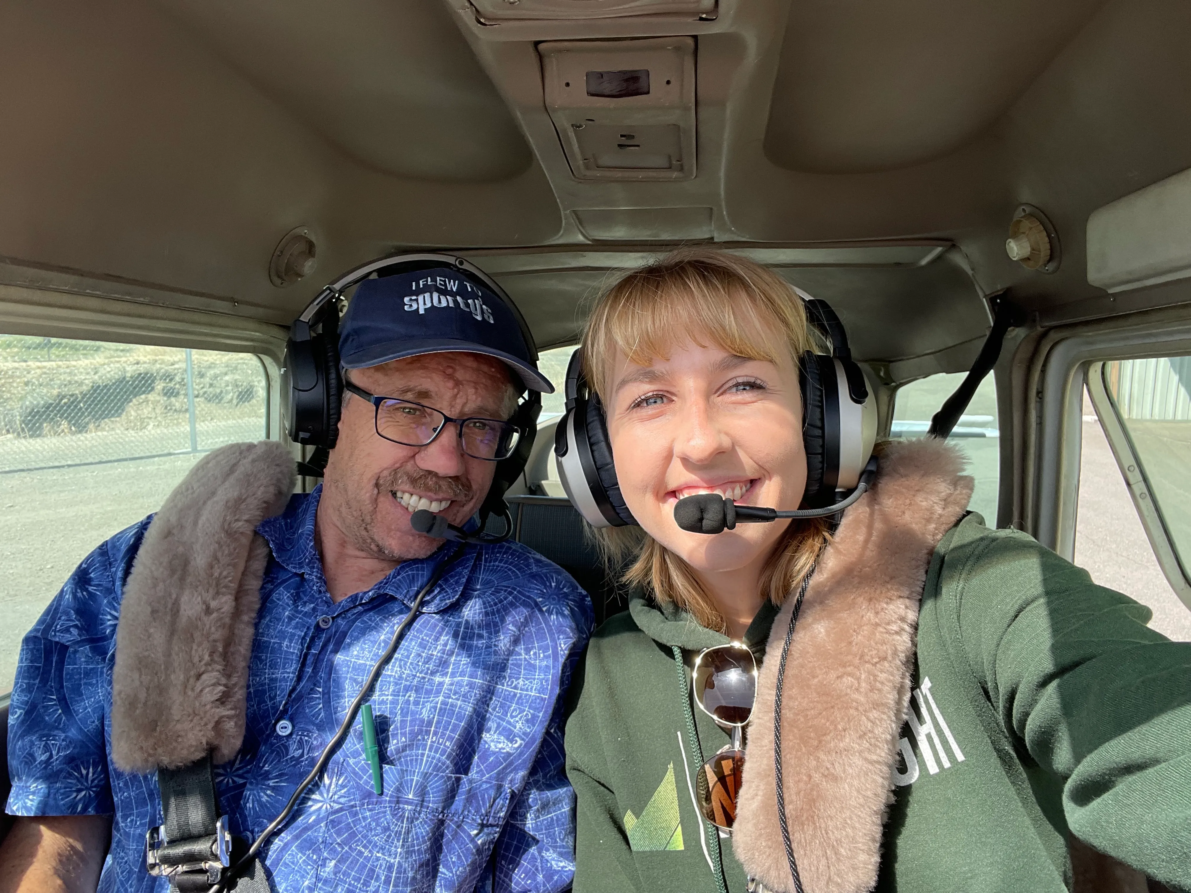 NV Flight School student and flight instructor in a Cessna airplane cockpit